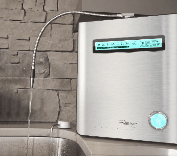 A silver water ionizer sitting on top of a counter.